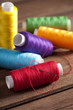 coloured bobbins of thread coloured bobbins of thread