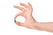 Hand and pill isolated on white background Hand and pill isolated on white background