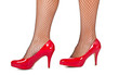 Woman's legs with red high hill shoes
