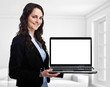 Woman showing a laptop with a blank screen Woman showing a laptop with a blank screen