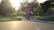 Little Girl Slowly Rides Her Bike To The Playground