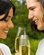 Young happy couple with champagne, outdoor