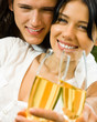 Young happy couple with champagne, outdoor
