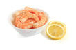 bowl with shrimps and sliced lemon