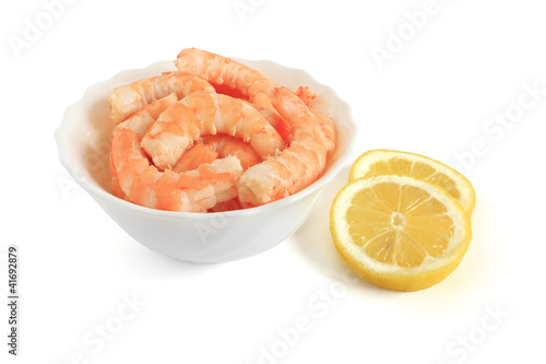 Photo: bowl with shrimps and sliced lemon bowl with shrimps and sliced lemon