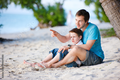 Photo: Father and son at beach Father and son at beach