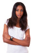 Beautiful young black woman with folded arms