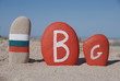 Flag and symbol of Bulgaria over the sand