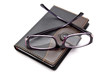 notebook and glasses
