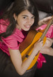 Latin Teenager Playing Guitar