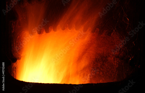Photo: Fire in a home furnace. Fire in a home furnace.