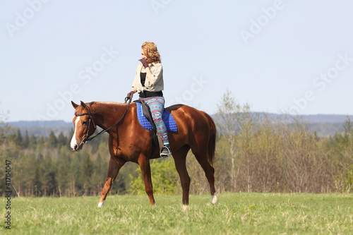 Foto: Girl on horseback Girl on horseback