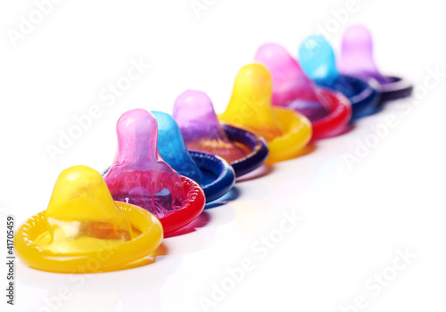 Photo: Close up of colorful condoms Close up of colorful condoms
