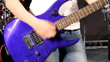 Close-up of female hand, playing the rhythm guitar