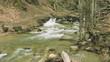 Rapid river with small waterfalls.