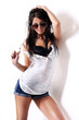 Photo: Sexy oiled girl with headphones Sexy oiled girl with headphones
