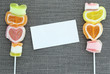 Colorful jelly candy stick and white paper label