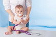 Photo: Doctor and baby patient. Doctor and baby patient.