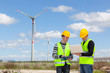 Two Engineers in a Wind Turbine Power Station Two Engineers in a Wind Turbine Power Station