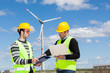 Two Engineers in a Wind Turbine Power Station Two Engineers in a Wind Turbine Power Station