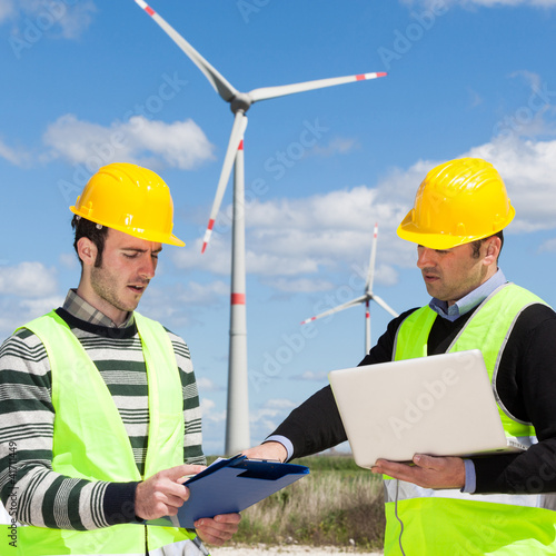 Photo: Two Engineers in a Wind Turbine Power Station Two Engineers in a Wind Turbine Power Station