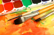 watercolor paints with brushes