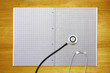 stethoscope on graph paper