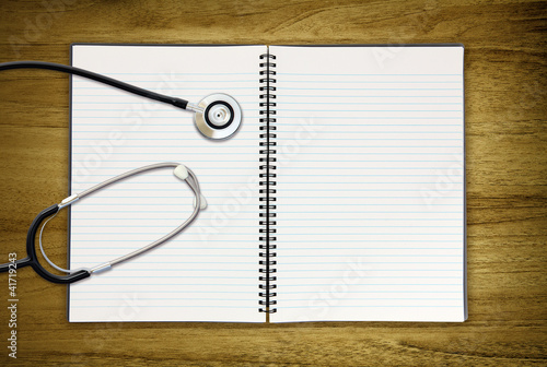 Photo: stethoscope on blank notepad stethoscope on blank notepad