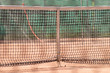 Tennis net on outdoor court closeup Tennis net on outdoor court closeup
