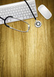 desktop computer and stethoscope