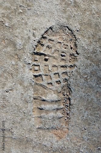 Photo: footprint on concrete texture footprint on concrete texture