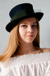 Beautiful girl in vintage hat