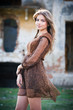 Attractive young woman posing outdoor in the field