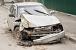 The old destroyed and abandoned car standing on the road The old destroyed and abandoned car standing on the road