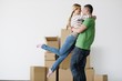 Young couple moving in new house