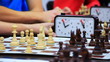 Close-up of chess game tournament with clock. Time lapse