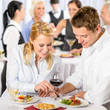 Foto: Catering company event young colleagues eat Catering company event young colleagues eat