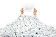 Person under crumpled pile of papers with a help sign / isolated