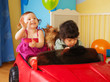 Kids with dog in the car