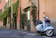 Vintage scooter parked in the street