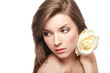 young beautiful girl with perfect skin  and a rose
