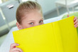 Peeking out of book