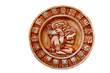 A carved Mayan calendar isolated on white