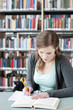 Photo: Female student studying Female student studying