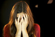 Girl hiding scared with behind her a black man