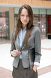 Foto: Standing businesswoman with documents Standing businesswoman with documents