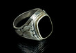 Ring on a black background with reflection