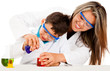 Mother and son playing scientists