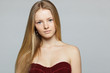 Closeup portrait picture of beautiful woman over grey background