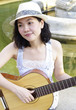 young woman with guitar